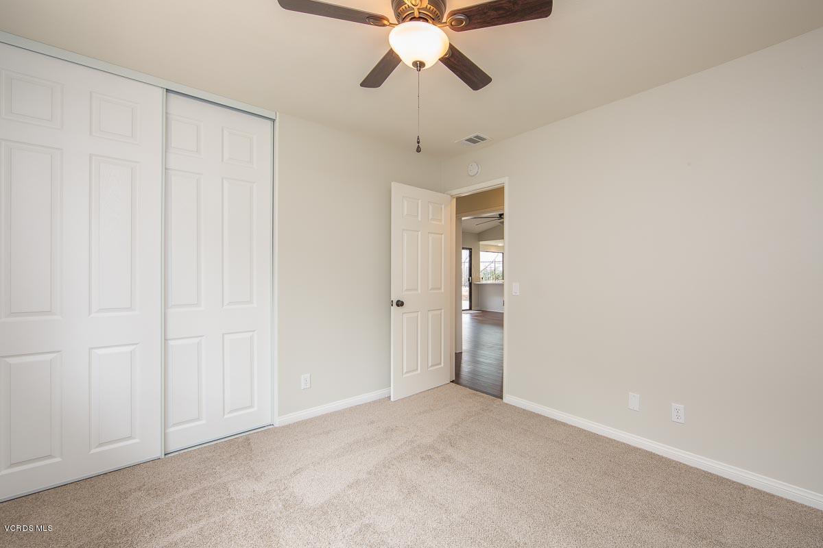 4265 Laurelhurst Road Moorpark, CA 93021 - Photo 17 of 47 a view of an empty room and chandelier fan
