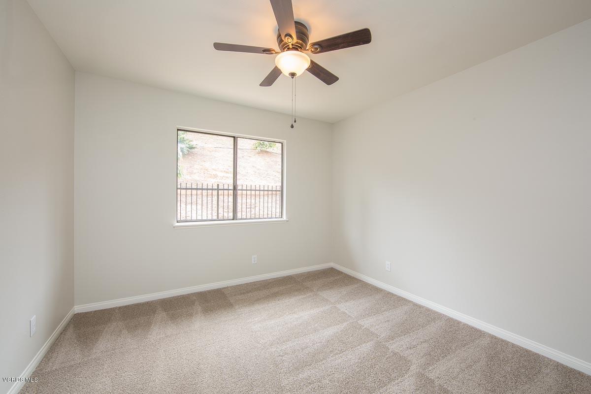4265 Laurelhurst Road Moorpark, CA 93021 - Photo 18 of 47 an empty room with a window and a fan