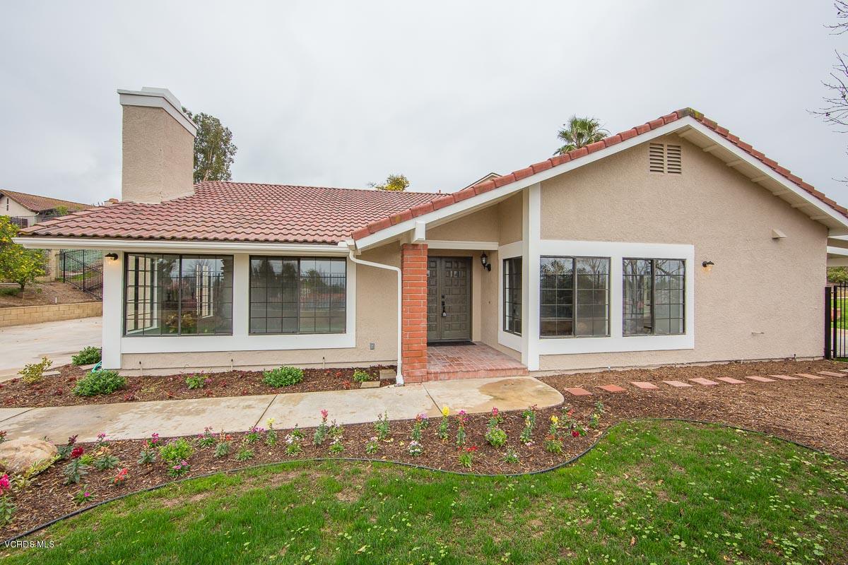 4265 Laurelhurst Road Moorpark, CA 93021 - Photo 3 of 47 a front view of a house with a yard