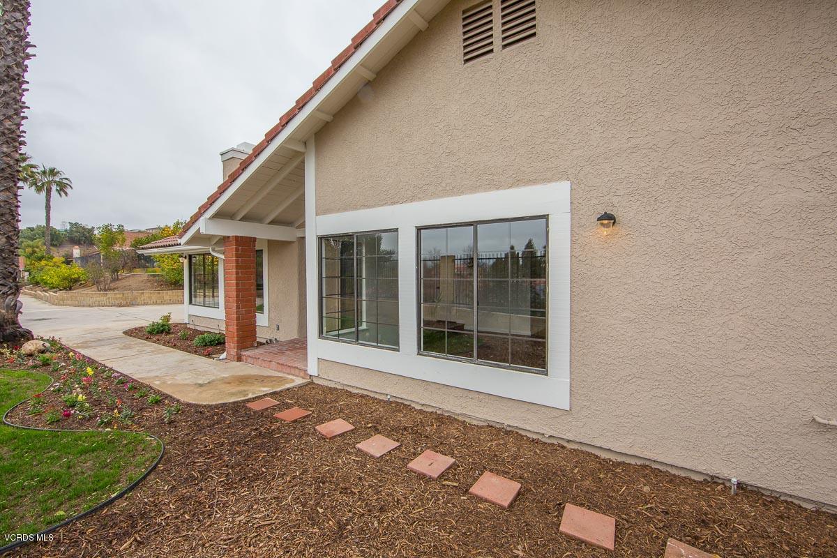 4265 Laurelhurst Road Moorpark, CA 93021 - Photo 27 of 47 a view of a house with backyard porch and sitting area