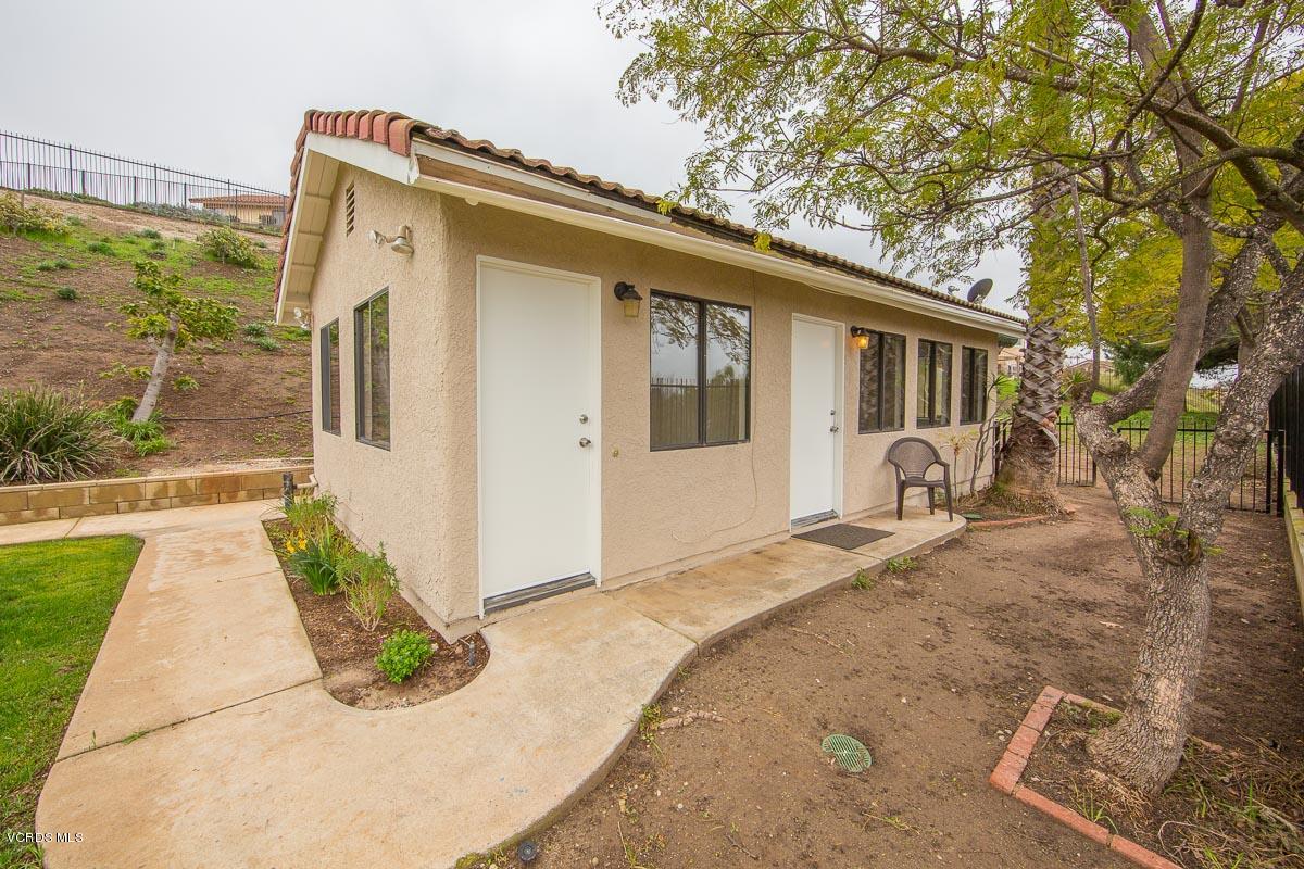 4265 Laurelhurst Road Moorpark, CA 93021 - Photo 34 of 47 a front view of a house with a porch