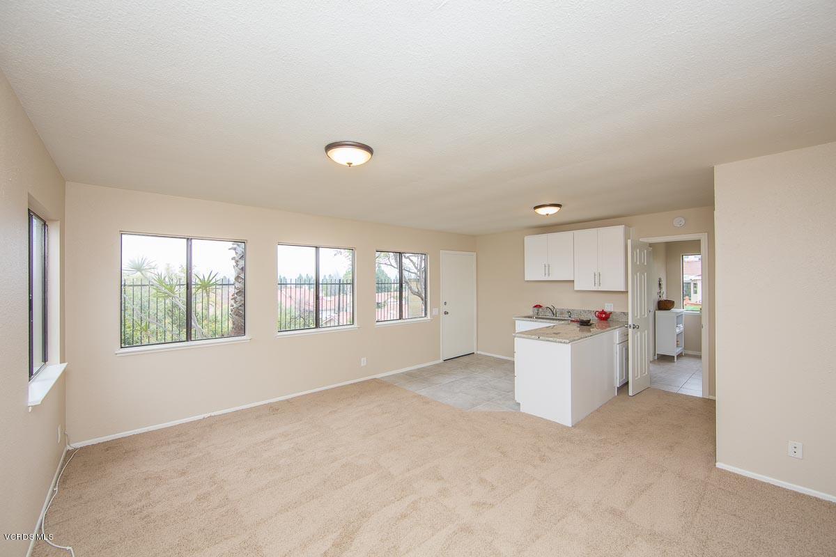 4265 Laurelhurst Road Moorpark, CA 93021 - Photo 38 of 47 a view of a kitchen with a sink dishwasher and a refrigerator