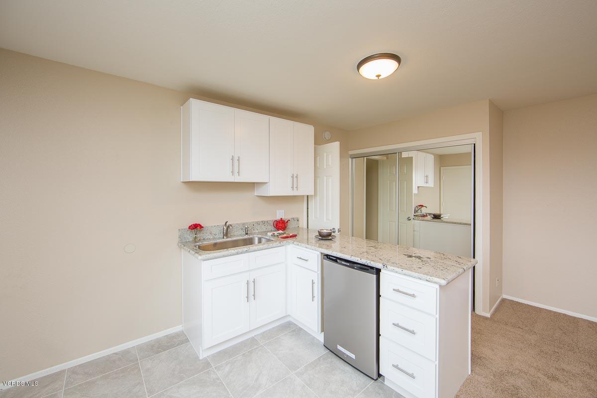 4265 Laurelhurst Road Moorpark, CA 93021 - Photo 39 of 47 a kitchen with a sink and cabinets