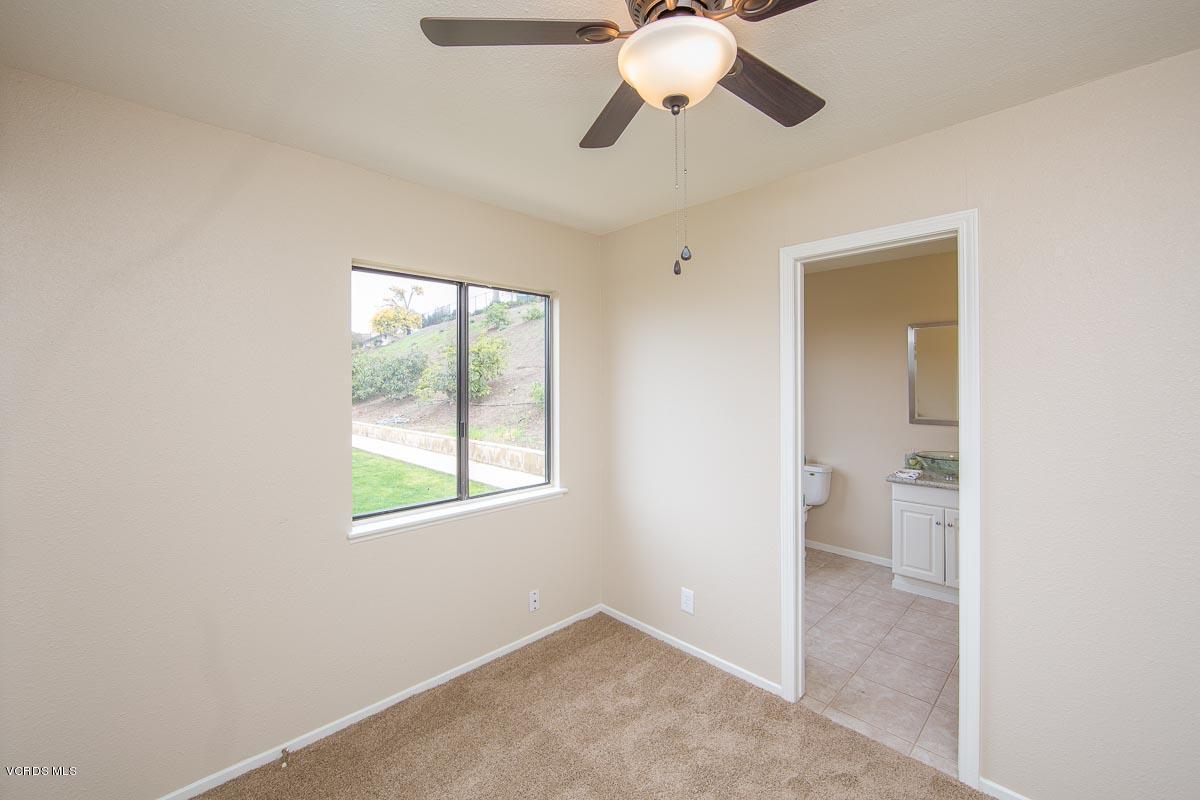 4265 Laurelhurst Road Moorpark, CA 93021 - Photo 43 of 47 an empty room and chandelier fan
