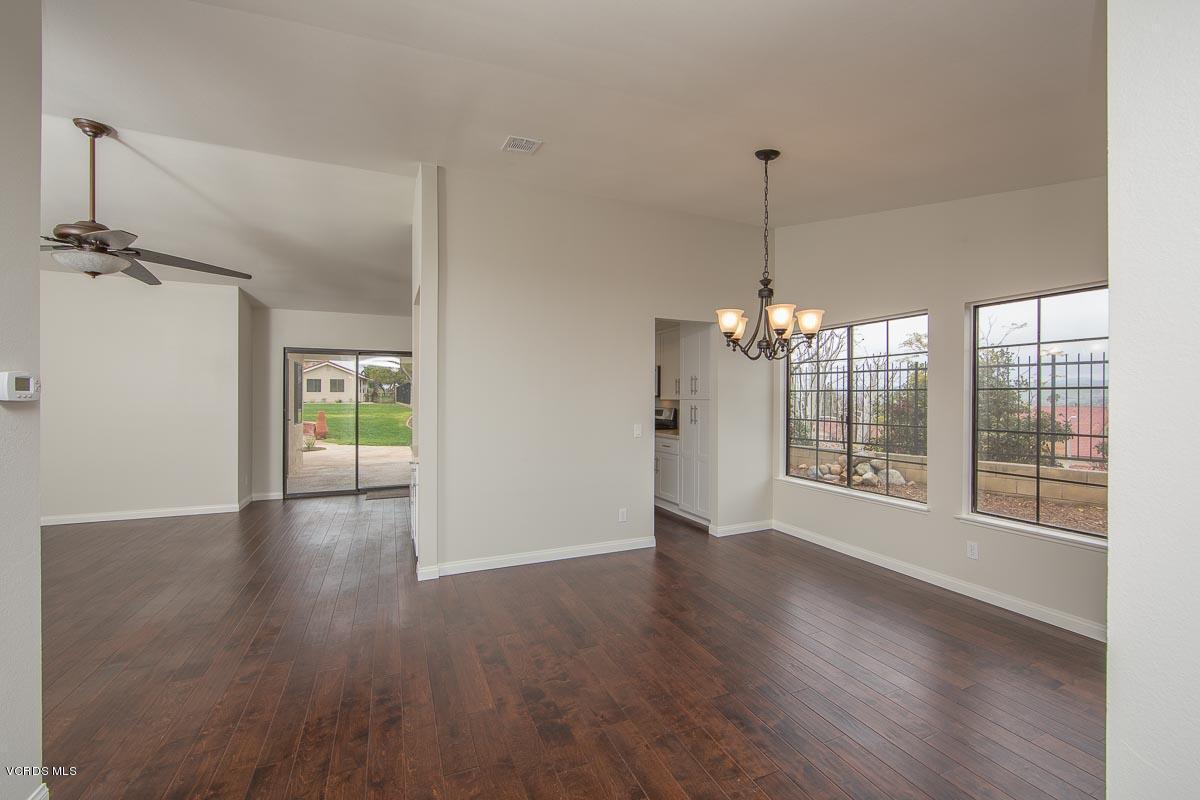 4265 Laurelhurst Road Moorpark, CA 93021 - Photo 7 of 47 a view of an empty room with window and wooden floor