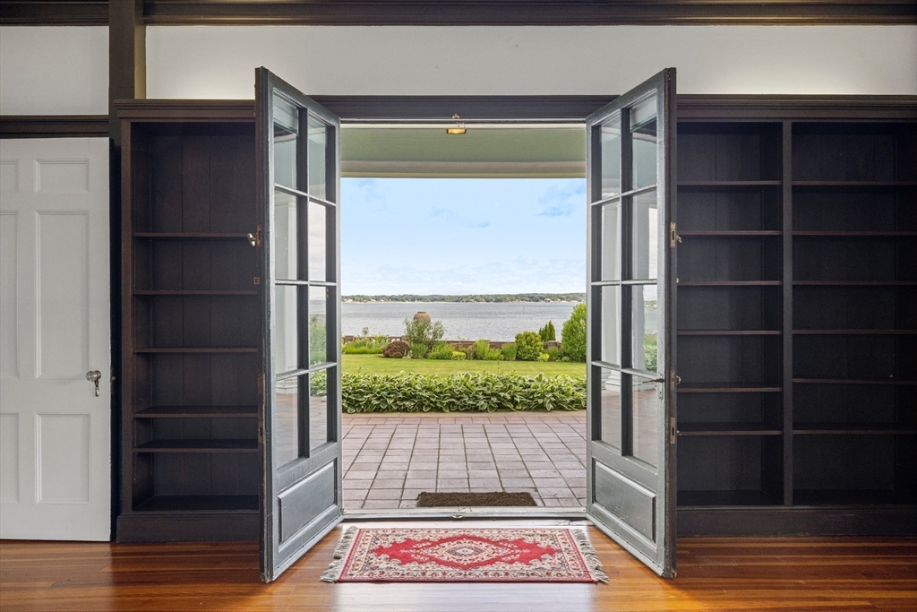 4 Broadmere Way Marblehead, MA 01945 - Photo 16 of 31 a view of a balcony with wooden floor and a potted plant