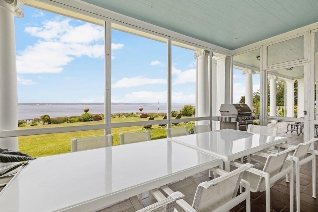 4 Broadmere Way Marblehead, MA 01945 - Photo 17 of 31 a view of a kitchen with a large window and dining table