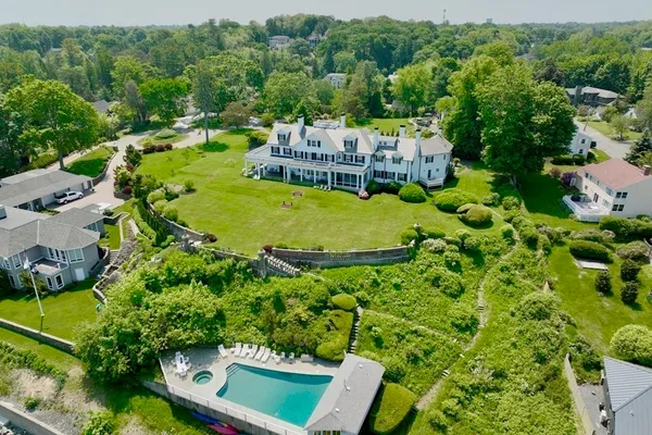 an aerial view of a house with a garden