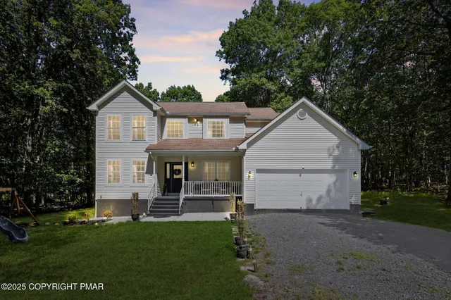 a view of outdoor space yard and large tree