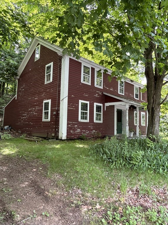 33 Sturbridge Road Brimfield, MA 01010 - Photo 1 of 18 a front view of a house with garden