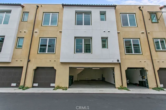 a front view of building with multiple windows
