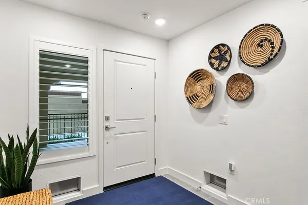 a view of a hallway with entryway