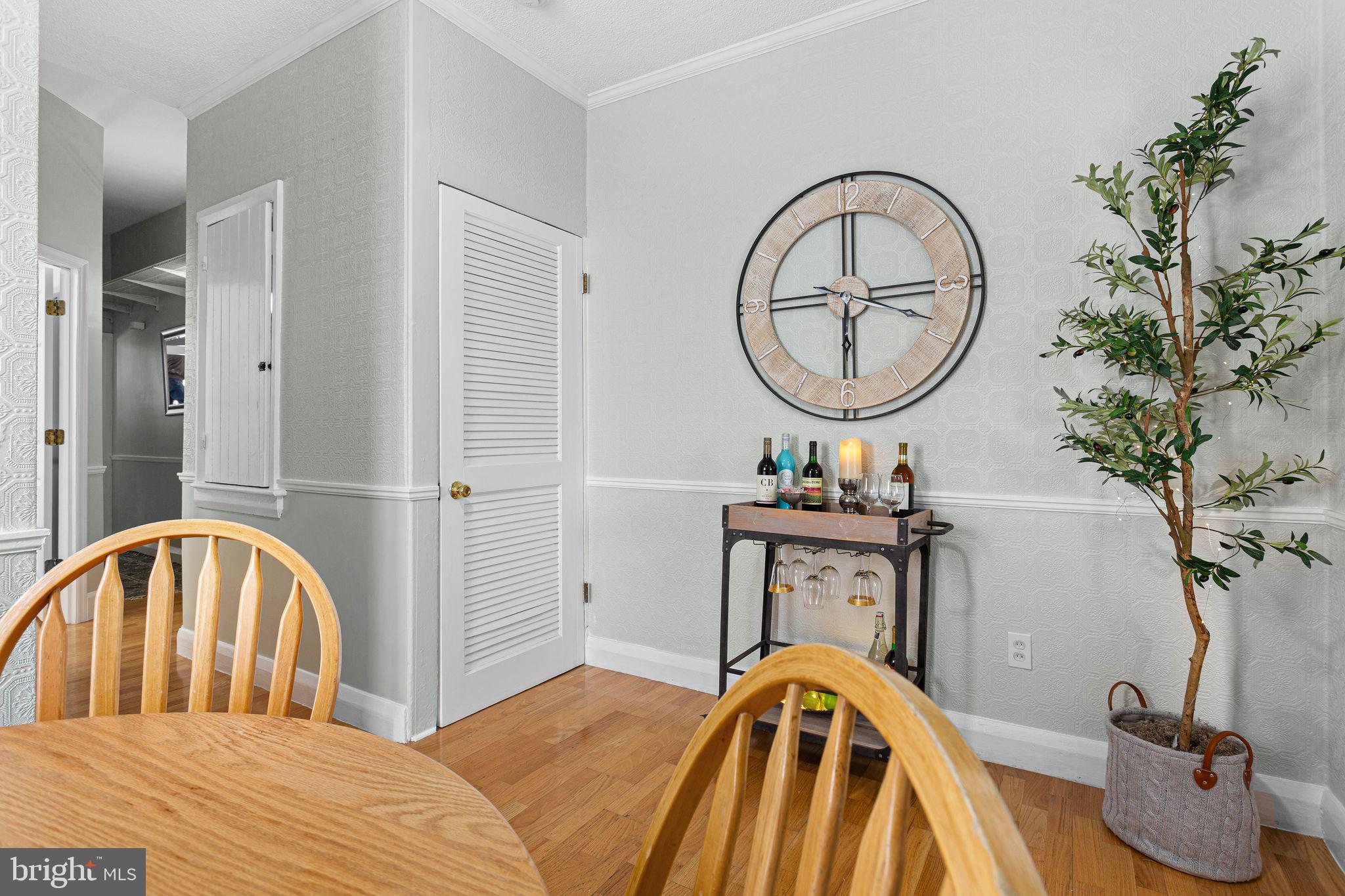 110 Potter Street Haddonfield, NJ 08033 - Photo 12 of 48 a bedroom with a bed a mirror and potted plants