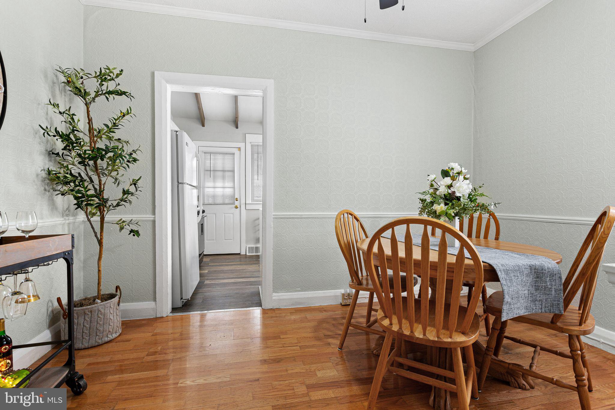 110 Potter Street Haddonfield, NJ 08033 - Photo 13 of 48 a view of a dining room with furniture and wooden floor