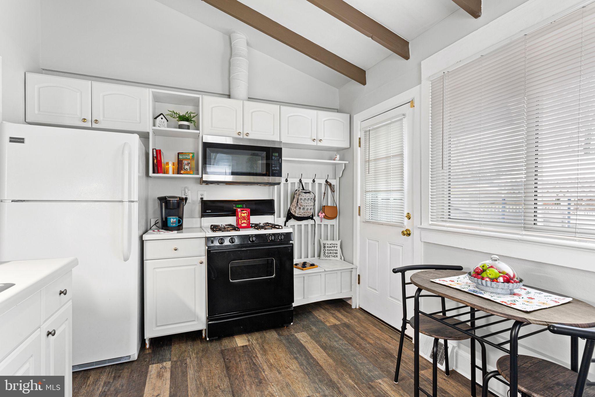 110 Potter Street Haddonfield, NJ 08033 - Photo 16 of 48 a kitchen with stainless steel appliances a stove a refrigerator and a refrigerator