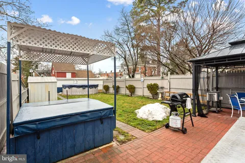 a view of a chair and table in the patio