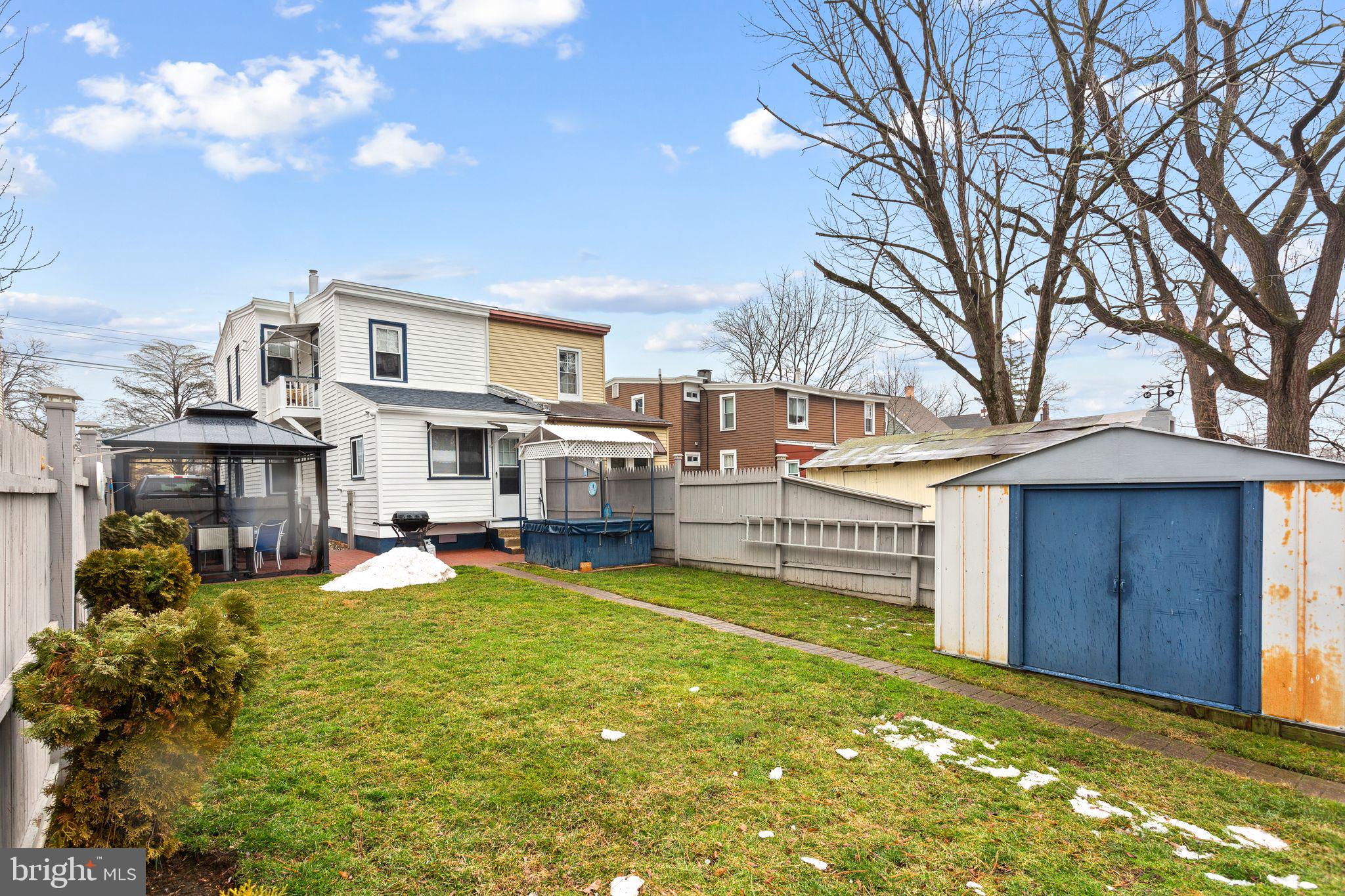 110 Potter Street Haddonfield, NJ 08033 - Photo 33 of 48 a view of a house with a big yard and large trees