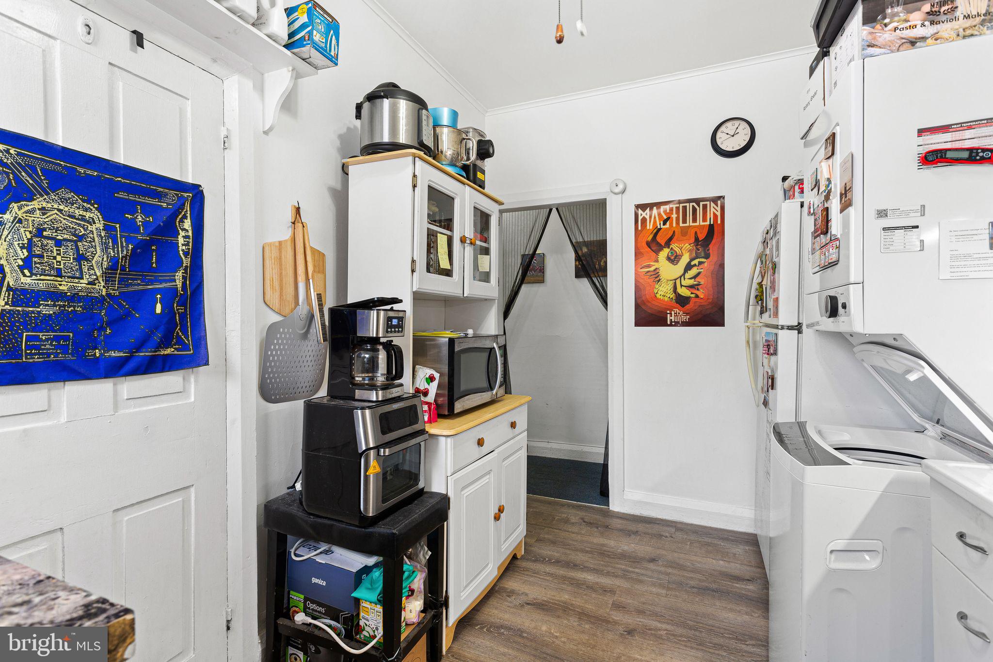 110 Potter Street Haddonfield, NJ 08033 - Photo 38 of 48 a view of a kitchen with fridge and workspace