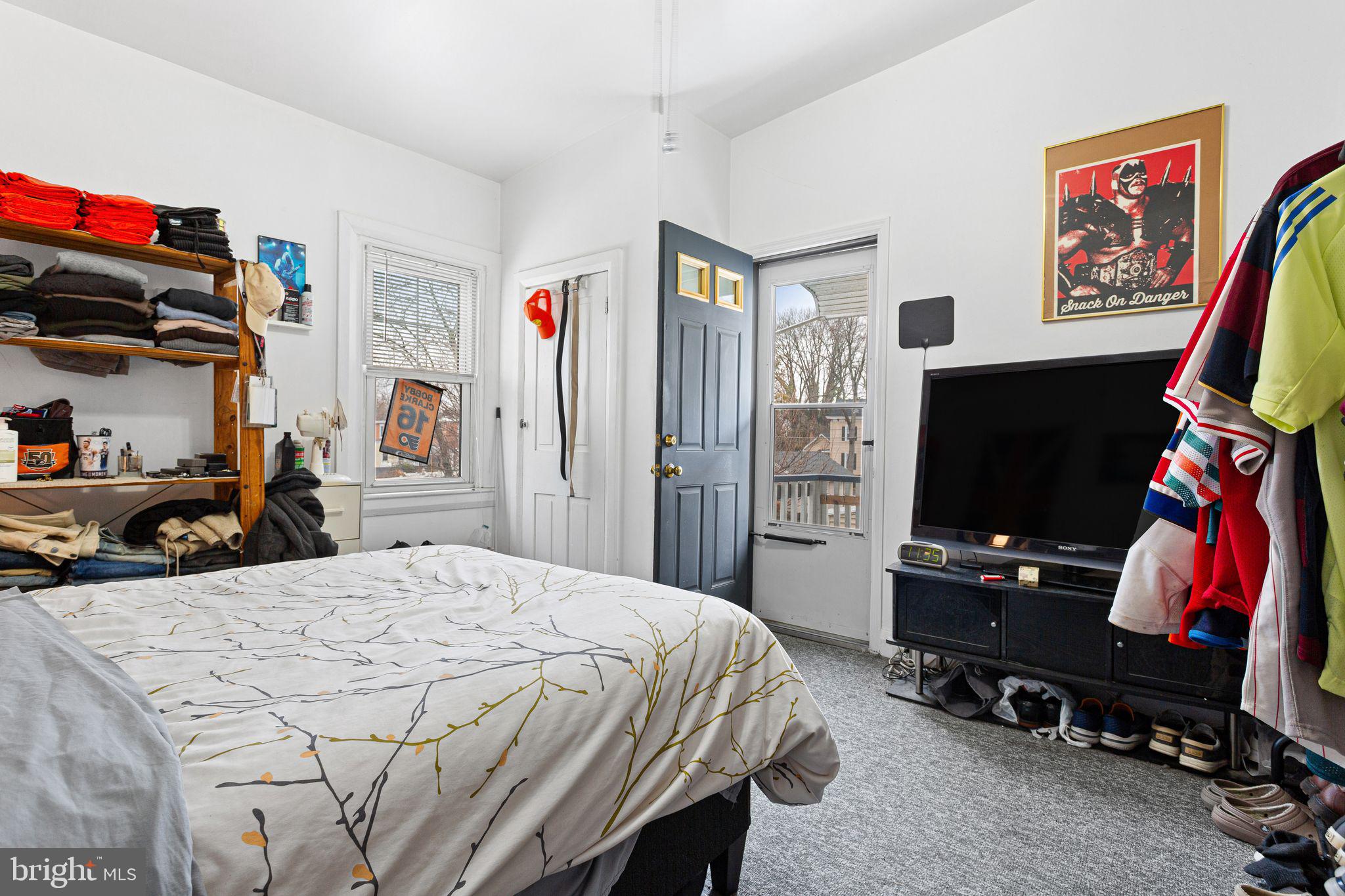 110 Potter Street Haddonfield, NJ 08033 - Photo 44 of 48 a bedroom with a bed and a flat screen tv