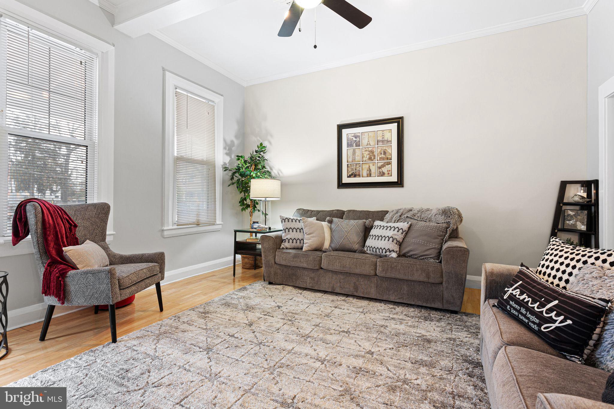 110 Potter Street Haddonfield, NJ 08033 - Photo 6 of 48 a living room with furniture and a window