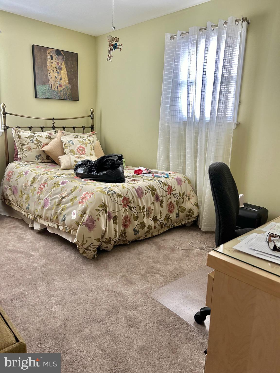 1017 Alpena Road Philadelphia, PA 19115 - Photo 17 of 30 a bedroom with bed and a window