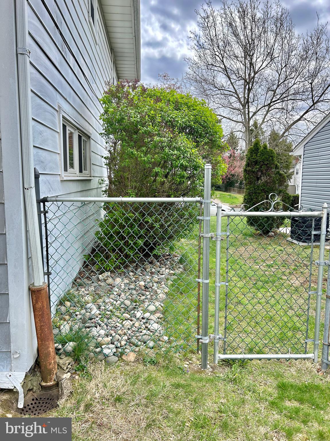 1017 Alpena Road Philadelphia, PA 19115 - Photo 22 of 30 a backyard of a house with lots of green space