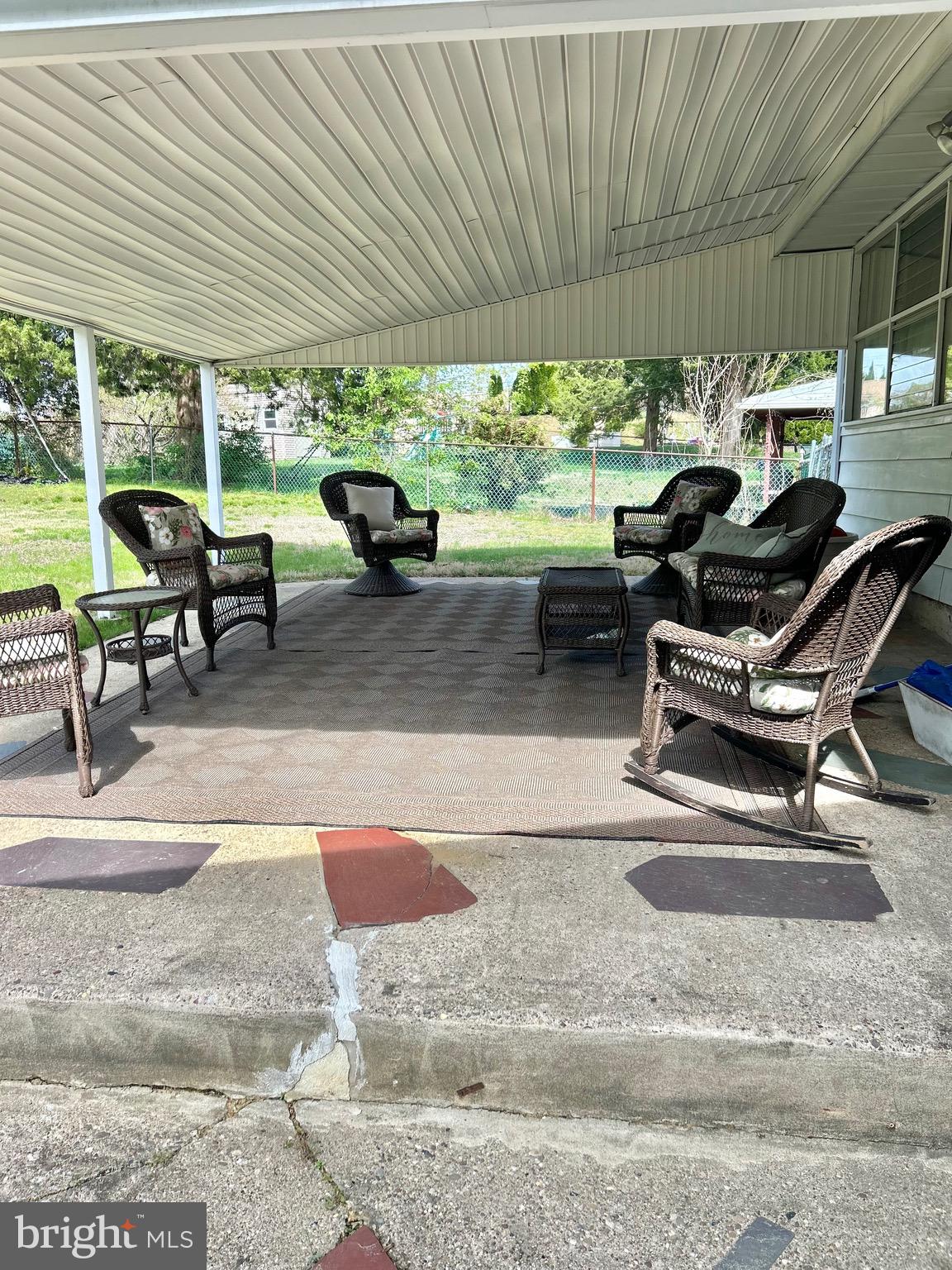 1017 Alpena Road Philadelphia, PA 19115 - Photo 29 of 30 a living room with patio furniture and a garden