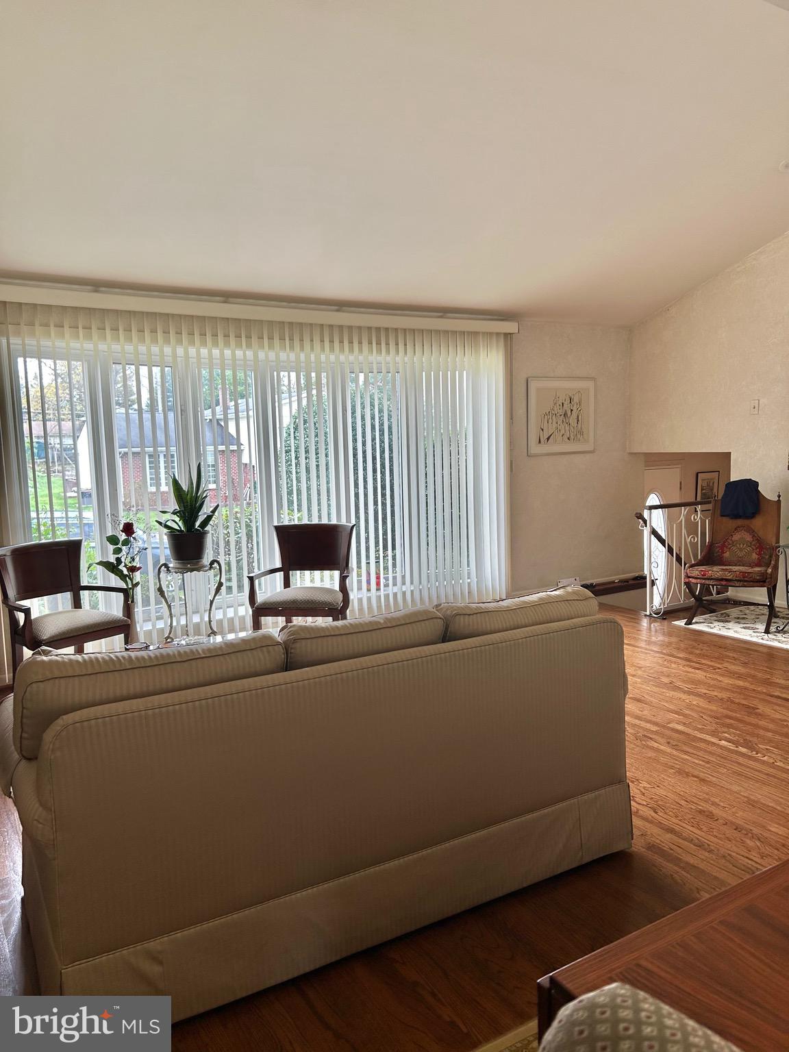 1017 Alpena Road Philadelphia, PA 19115 - Photo 6 of 30 a living room with furniture and large windows