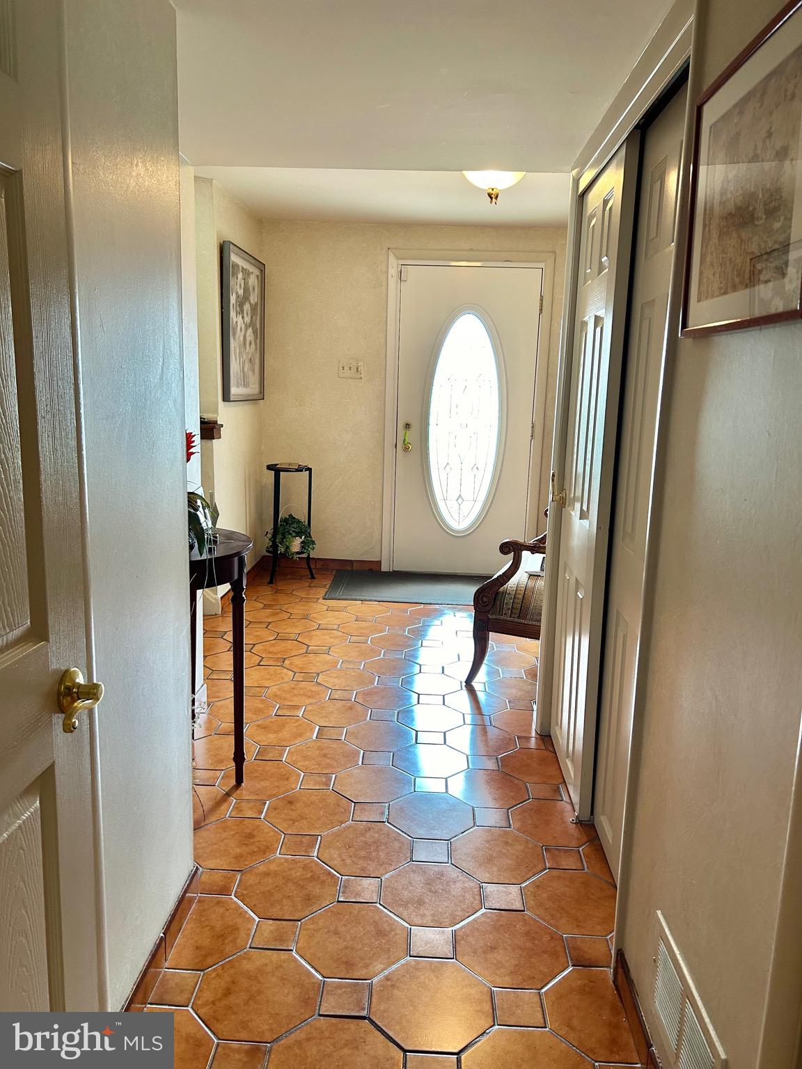 1017 Alpena Road Philadelphia, PA 19115 - Photo 8 of 30 a view of a hallway with wooden floor