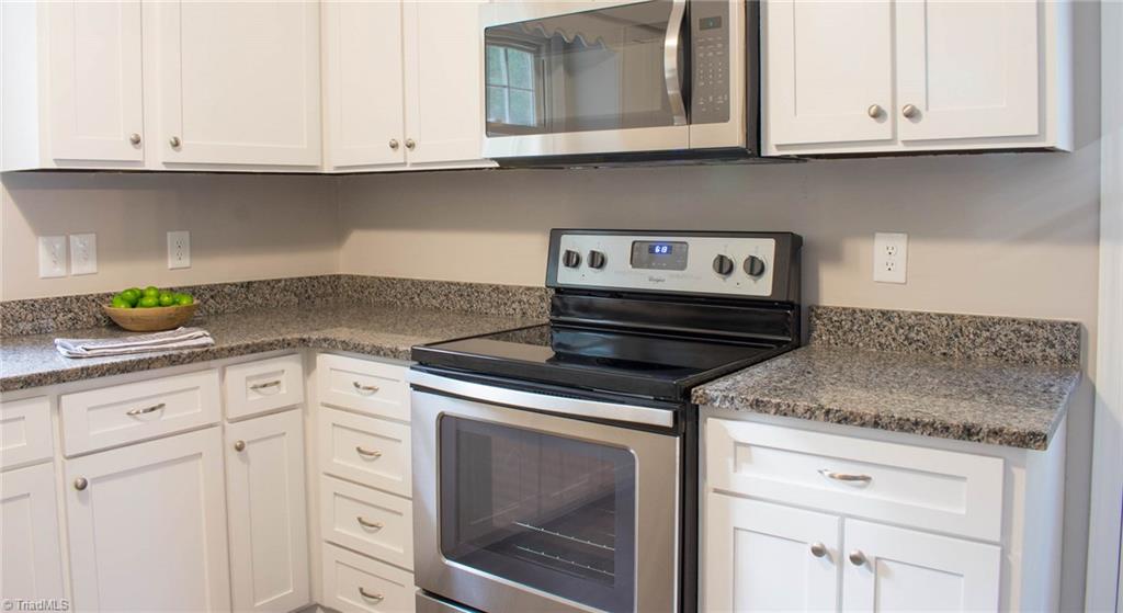 Kitchen With Granite And Stainless Steel Appliances!