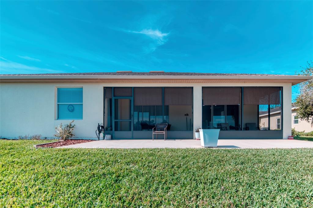 729 Glendora Road Kissimmee, FL 34759 - Photo 24 of 56 a view of a house with yard