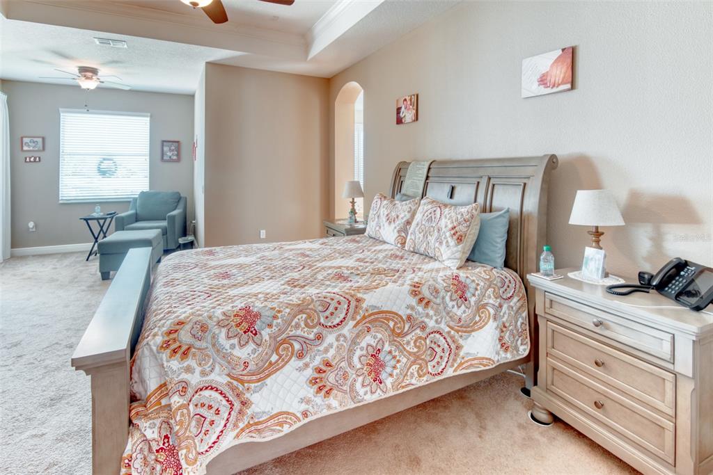 729 Glendora Road Kissimmee, FL 34759 - Photo 25 of 56 a bedroom with a bed and dresser