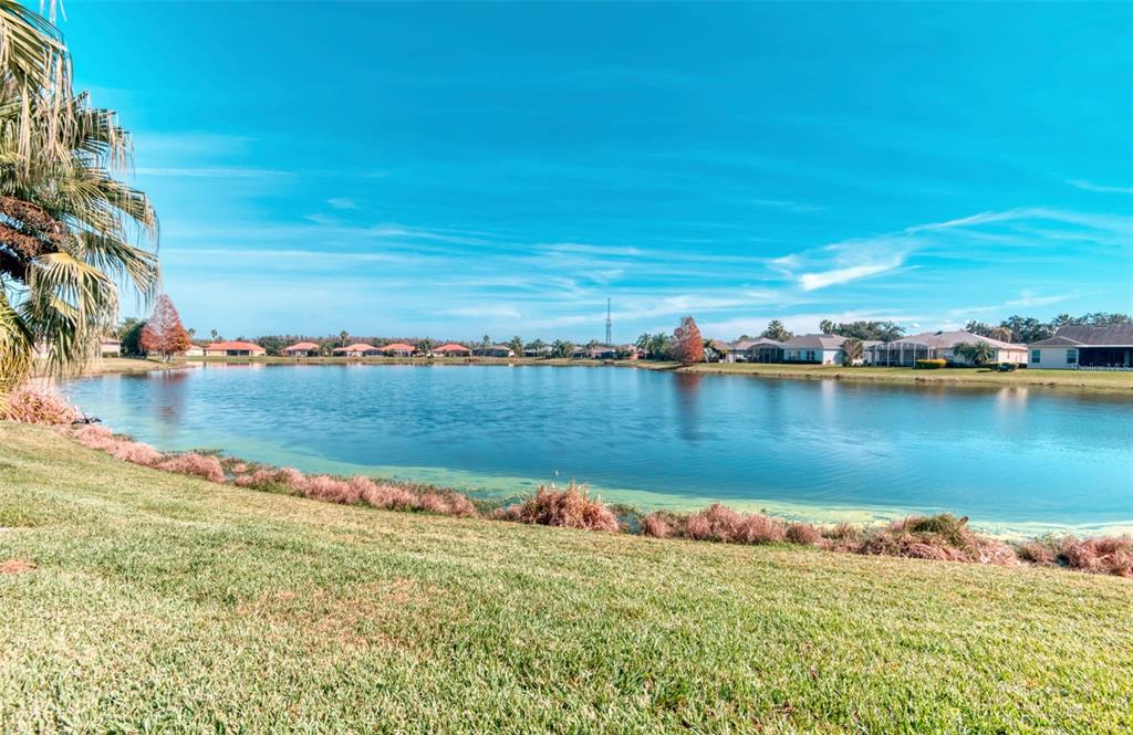 729 Glendora Road Kissimmee, FL 34759 - Photo 3 of 56 a view of a lake in between the city and lake