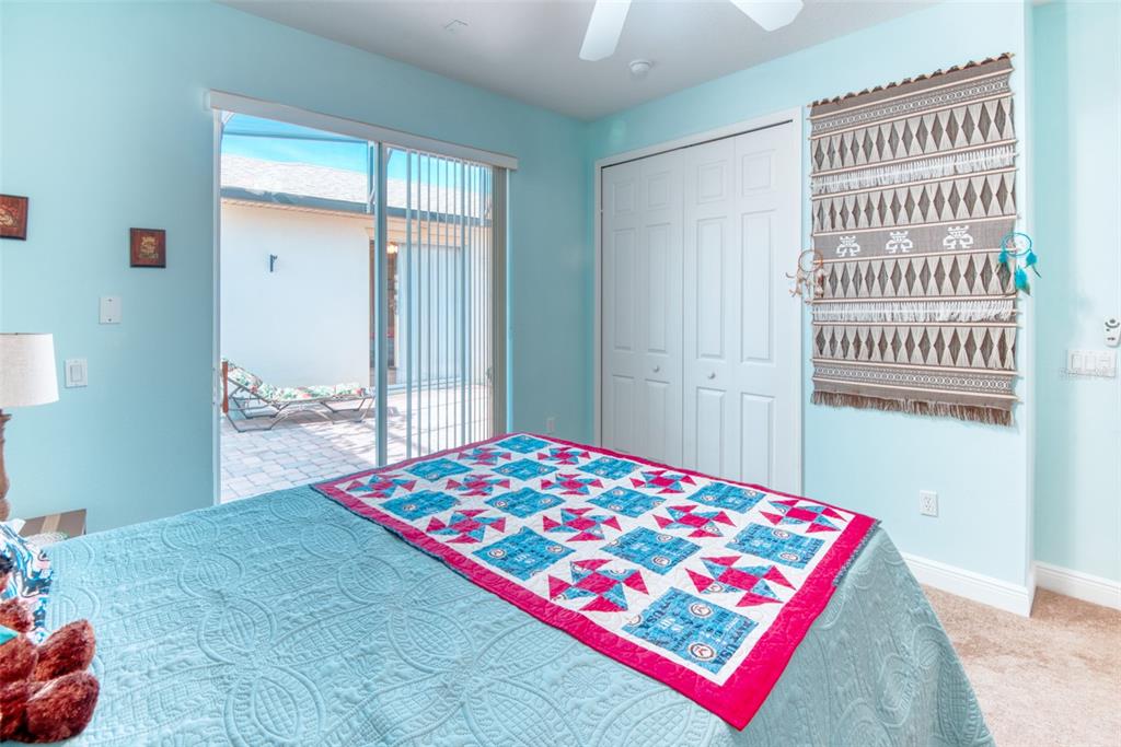 729 Glendora Road Kissimmee, FL 34759 - Photo 37 of 56 a bedroom with a bed and a window