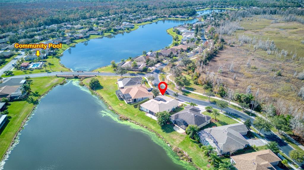 729 Glendora Road Kissimmee, FL 34759 - Photo 50 of 56 an aerial view of a house with a lake view