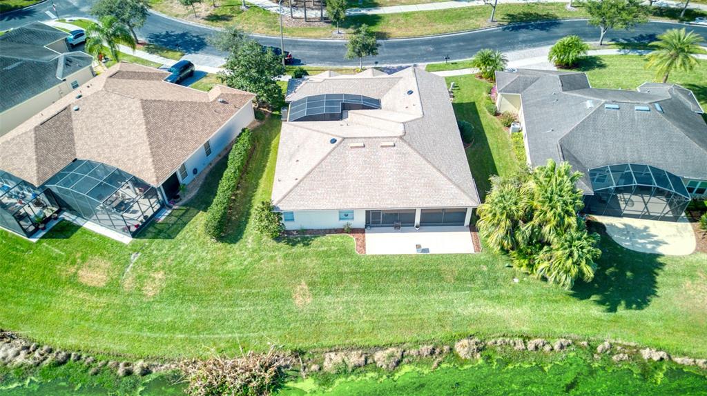 729 Glendora Road Kissimmee, FL 34759 - Photo 54 of 56 a view of a house with a yard