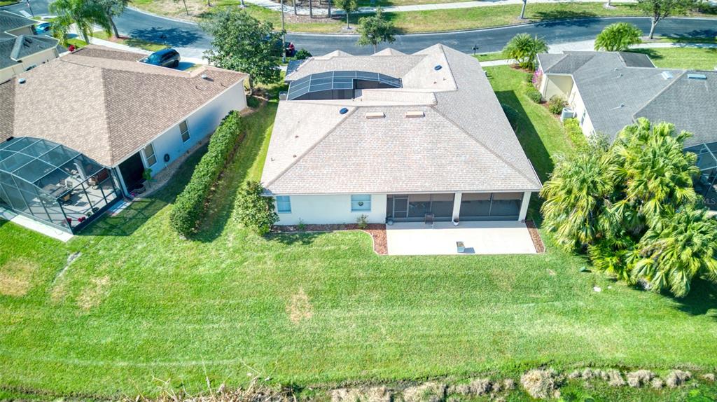 729 Glendora Road Kissimmee, FL 34759 - Photo 55 of 56 an aerial view of a house with swimming pool garden and patio