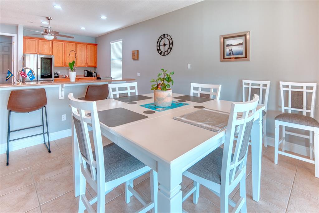729 Glendora Road Kissimmee, FL 34759 - Photo 10 of 56 a view of a dining room with furniture