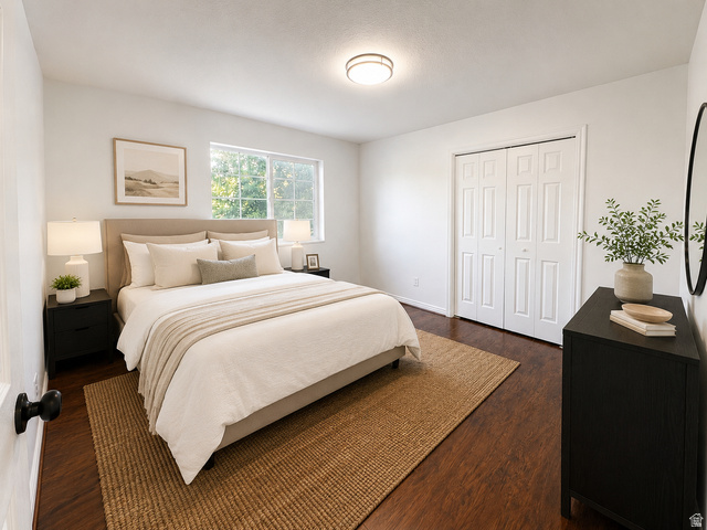 30 West 7500th Street South, Unit 18 Midvale, UT 84047 - Photo 12 of 14 Spacious room featuring rich wood-finish flooring, a large window, and white walls