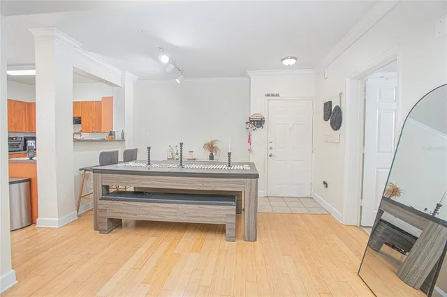 a room with a sink and a mirror