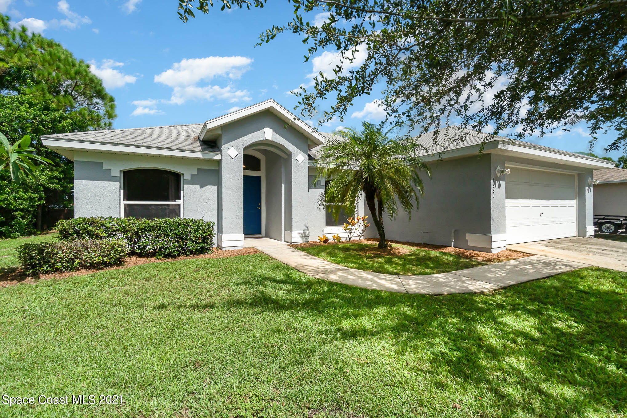 1380 Ran Road Southeast Palm Bay, FL 32909 - Photo 1 of 20 a view of a house with a yard
