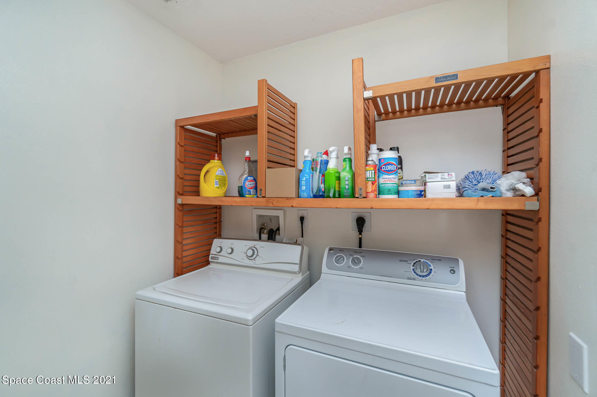 1380 Ran Road Southeast Palm Bay, FL 32909 - Photo 17 of 20 a room with storage and utility