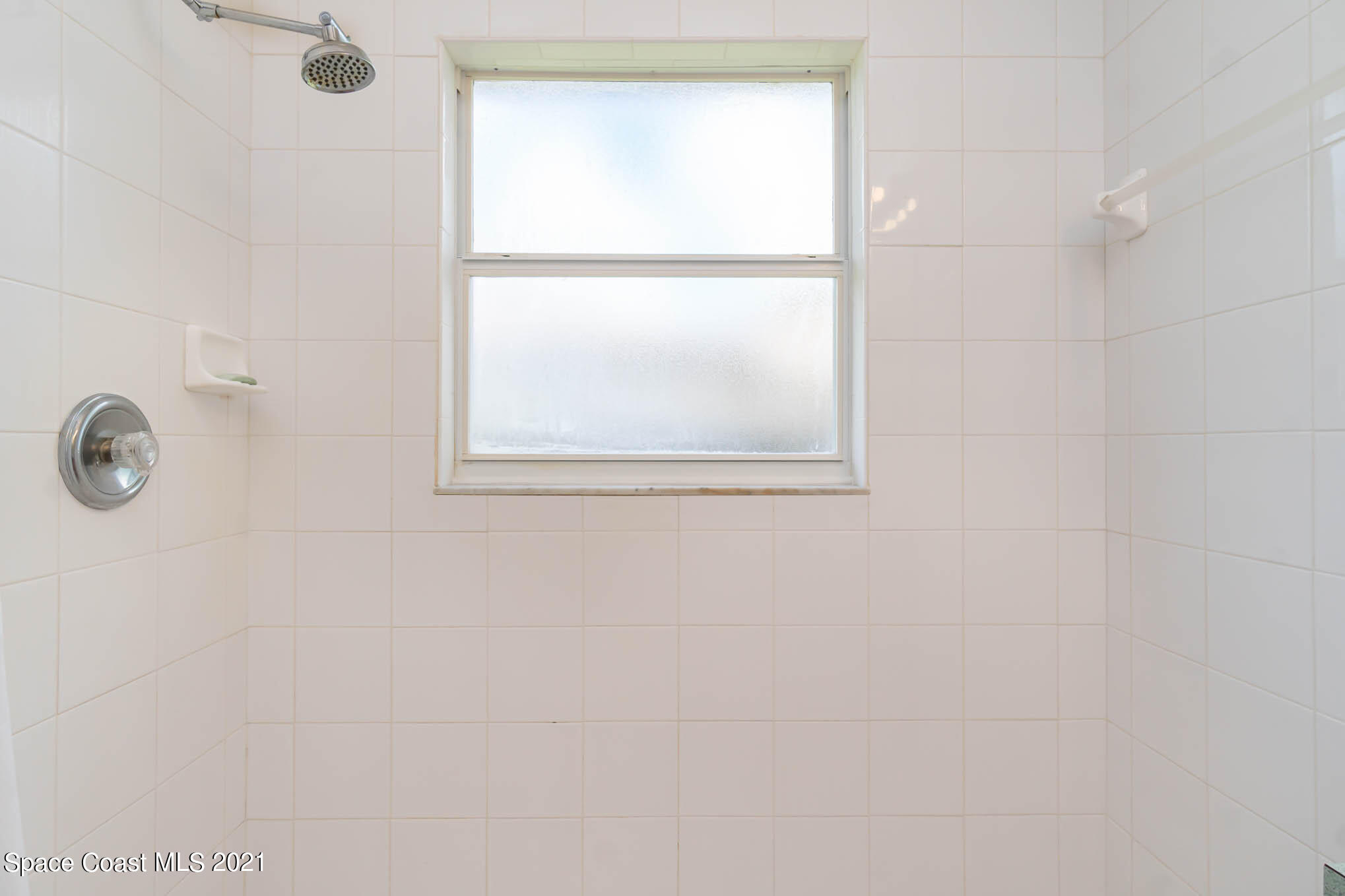 1380 Ran Road Southeast Palm Bay, FL 32909 - Photo 8 of 20 an empty room with a window