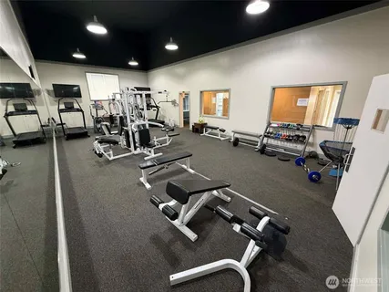 a view of a room with gym equipment