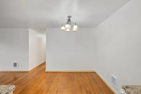 a very nice looking room with wooden floor