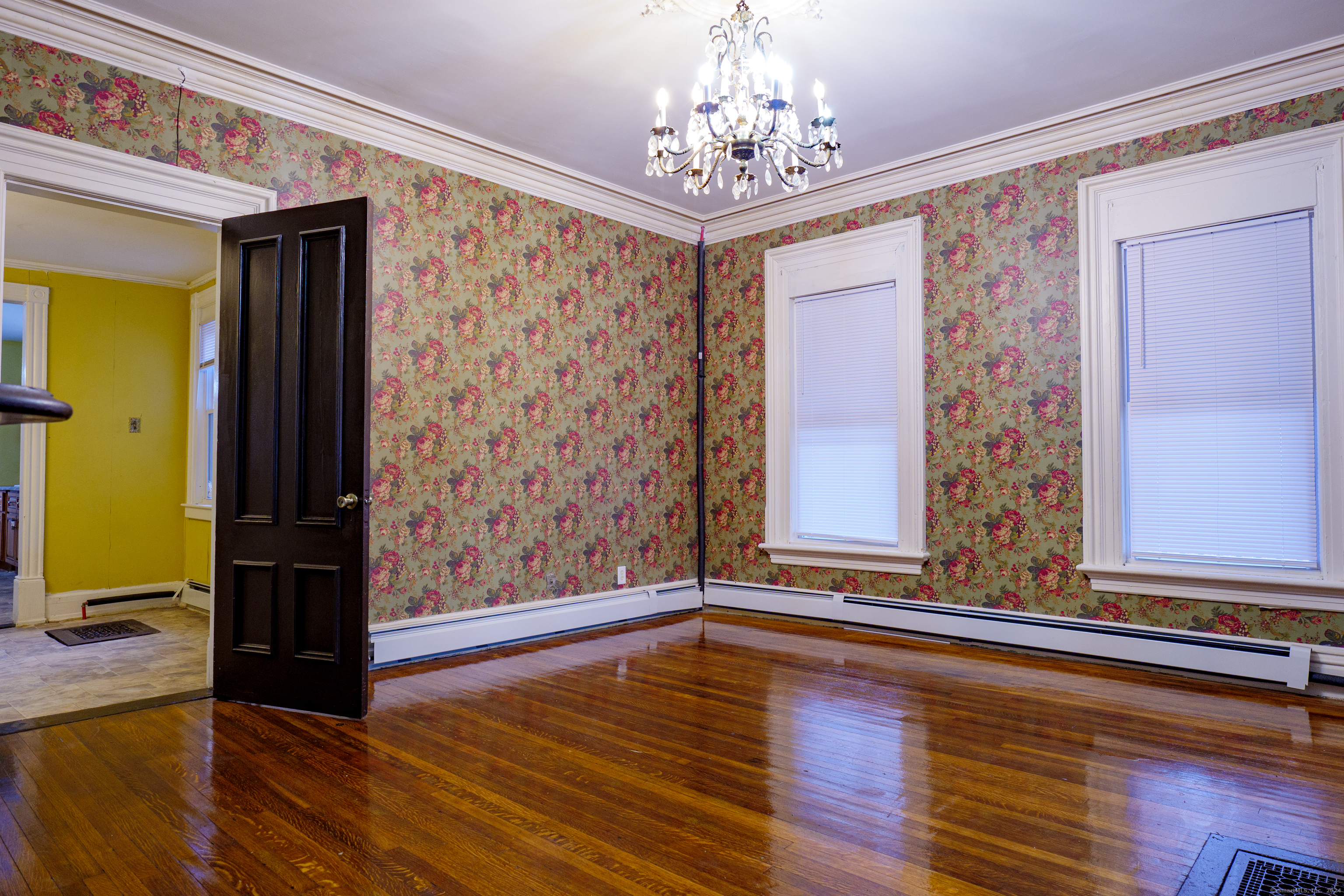 30 Main Street Plainfield, CT 06332 - Photo 6 of 16 a view of a room with wooden floor and windows