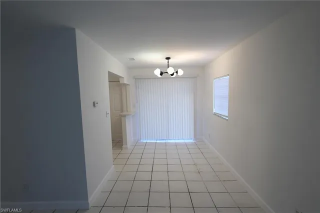 a kitchen with granite countertop cabinets stainless steel appliances and a sink