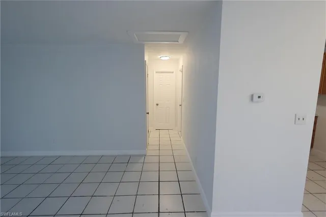 a bathroom with a shower a sink a toilet and mirror