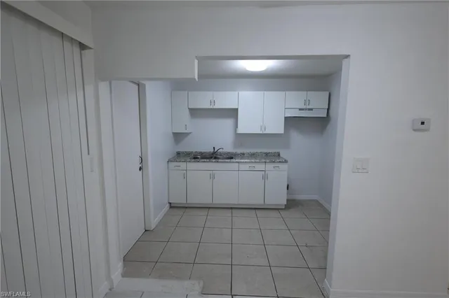 a bathroom with a sink and a shower