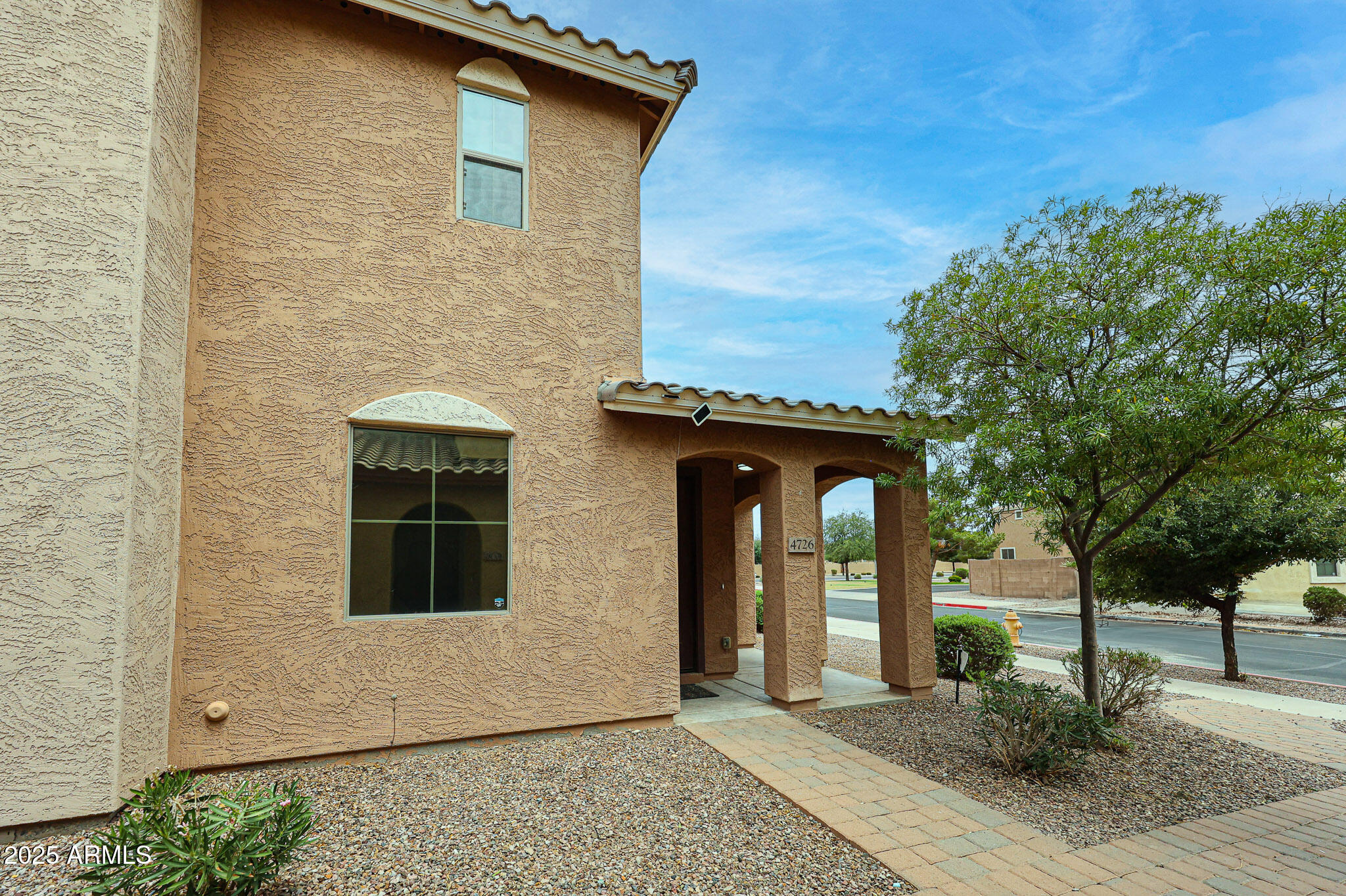 4726 West Fremont Rd. Laveen, AZ 85339 - Photo 3 of 50 a front view of a house with parking